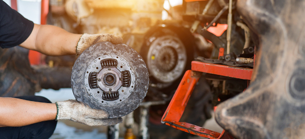 What is a clutch in a car and how does it work?